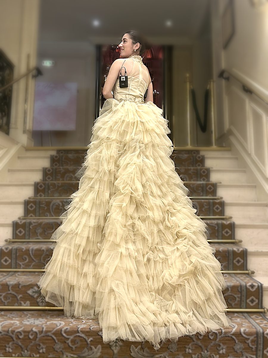 Juliette Carlon before a performance, palace staircase